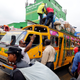 Passengers gather to use public bus transport as they travel to the countryside ahead of next week's general election in Nairobi, Kenya August 3, 2017.